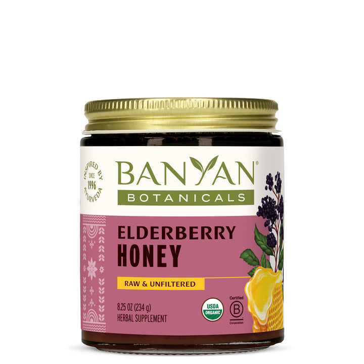 Elderberry honey jar on white background