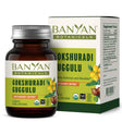 Goshuradi Guggulu tables in glass bottle in front of box