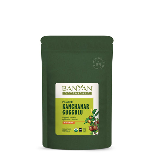3.5 oz: Kanchanar Guggulu powder in green pouch on white background
